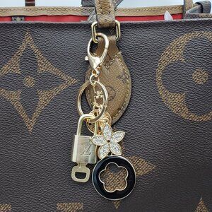 Authentic Louis Vuitton Lock & Key with Unbranded Flower Charm, Keychain